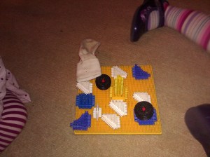 stickle bricks and sock