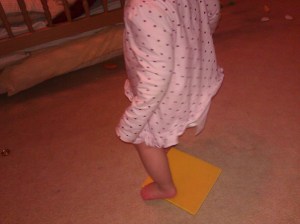 stickle bricks and bare feet