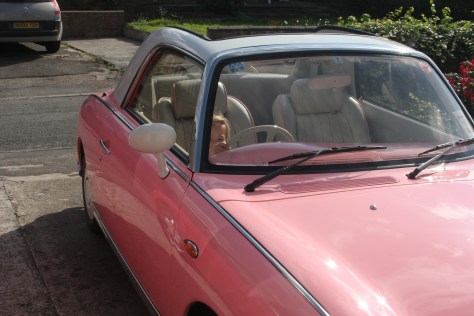 pink nissan figaro