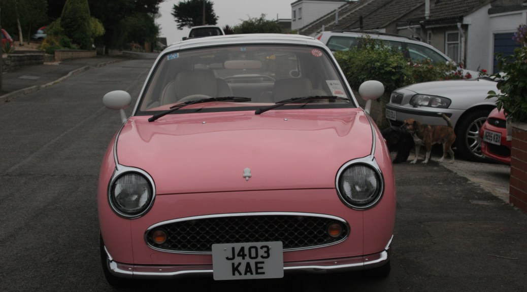 pink nissan figaro