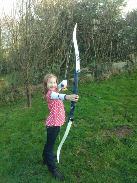 child with archery bow
