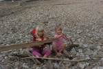making a rowing boat from driftwood.