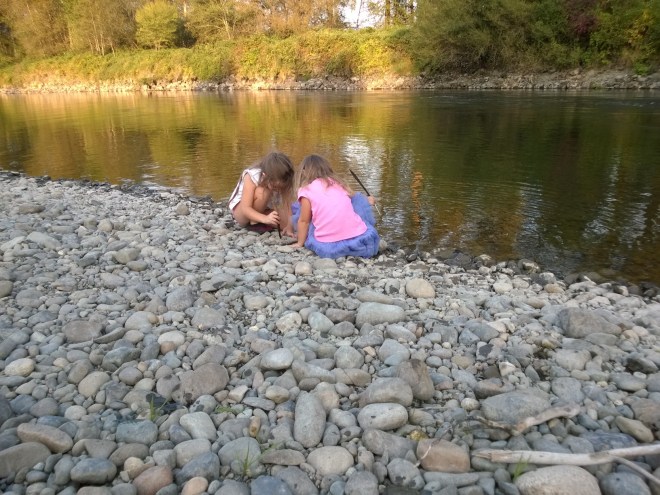Drawing with sticks on rocks