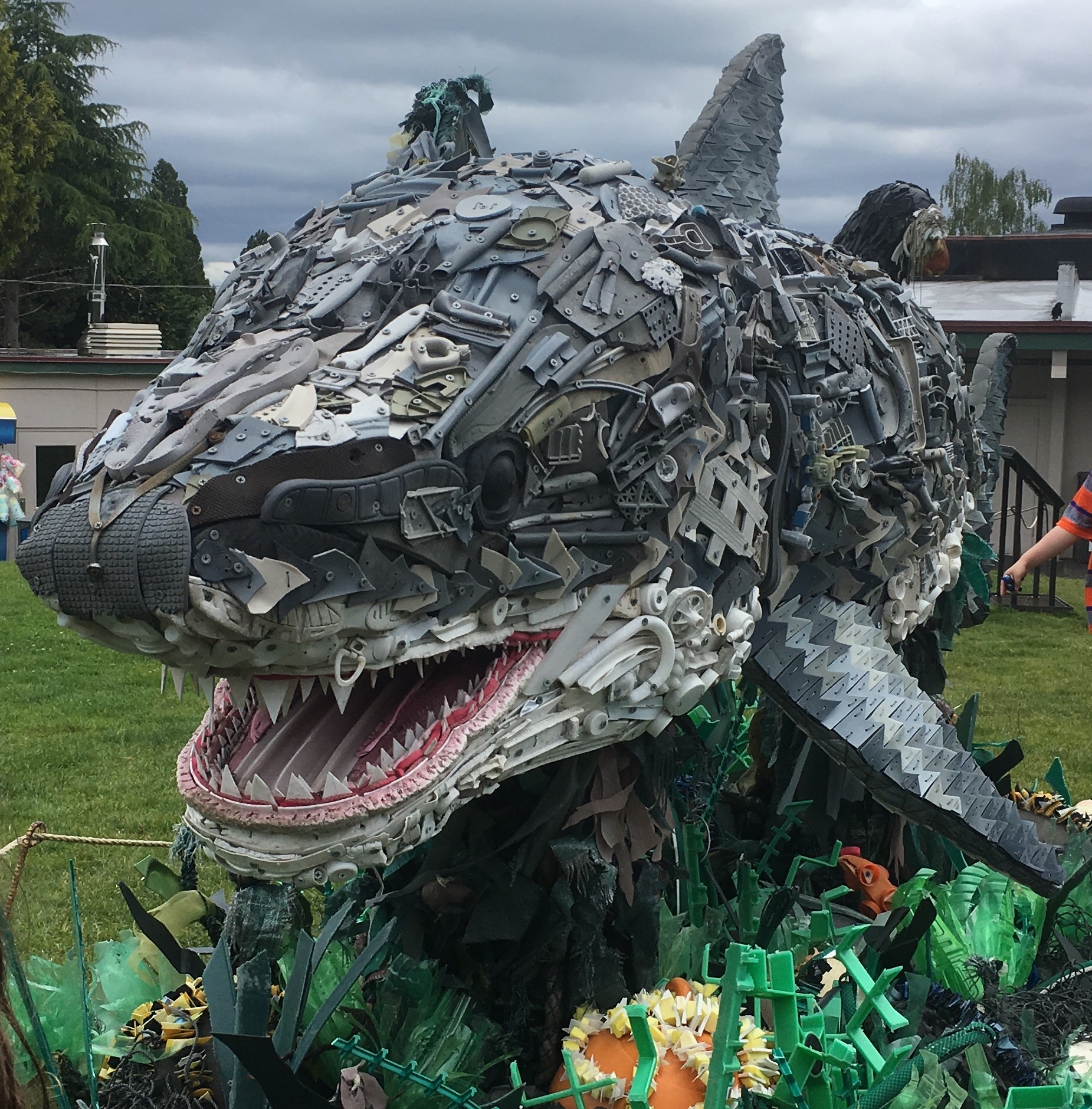 shark sculpture made from plastic washed ashore