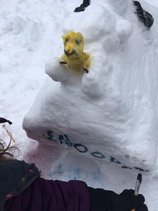woodstock and snoopy snow sculture